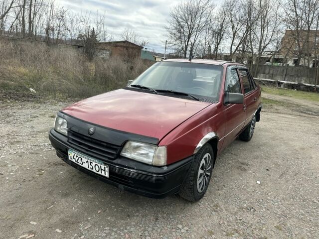 Красный Опель Кадет, объемом двигателя 1.5 л и пробегом 250 тыс. км за 599 $, фото 1 на Automoto.ua