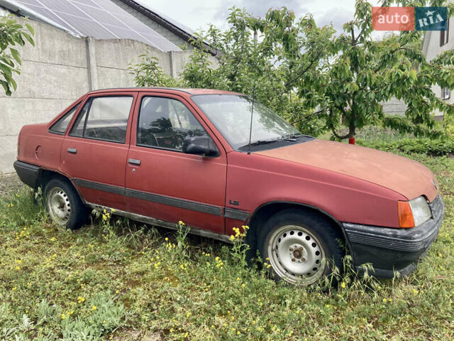 Красный Опель Кадет, объемом двигателя 1.4 л и пробегом 300 тыс. км за 433 $, фото 1 на Automoto.ua