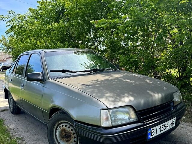 Серый Опель Кадет, объемом двигателя 1.6 л и пробегом 200 тыс. км за 750 $, фото 1 на Automoto.ua