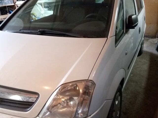 Белый Опель Мерива, объемом двигателя 1.4 л и пробегом 236 тыс. км за 5300 $, фото 1 на Automoto.ua