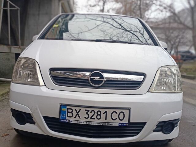 Белый Опель Мерива, объемом двигателя 1.2 л и пробегом 270 тыс. км за 4300 $, фото 1 на Automoto.ua