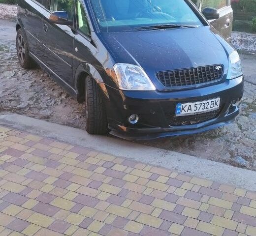 Черный Опель Мерива, объемом двигателя 1.6 л и пробегом 235 тыс. км за 3516 $, фото 1 на Automoto.ua
