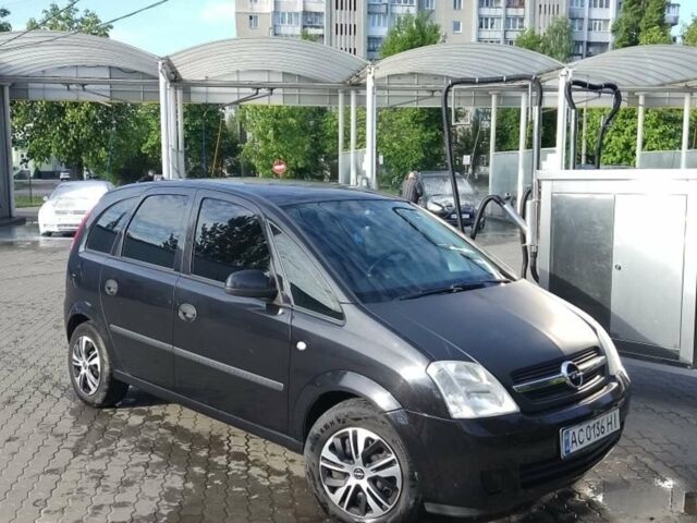Черный Опель Мерива, объемом двигателя 1.6 л и пробегом 300 тыс. км за 3800 $, фото 1 на Automoto.ua