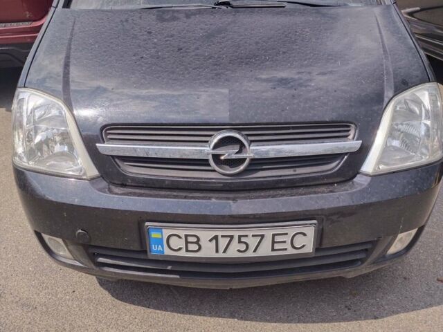 Черный Опель Мерива, объемом двигателя 1.6 л и пробегом 161 тыс. км за 3150 $, фото 1 на Automoto.ua
