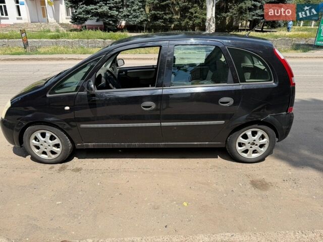 Чорний Опель Меріва, об'ємом двигуна 1.6 л та пробігом 263 тис. км за 2000 $, фото 1 на Automoto.ua