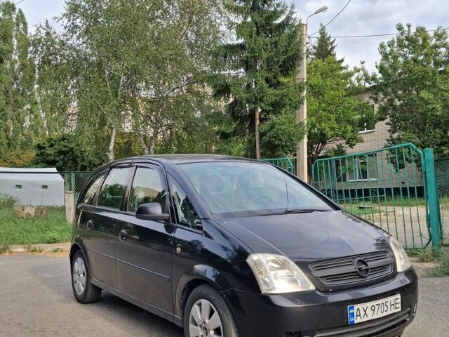 Черный Опель Мерива, объемом двигателя 1.7 л и пробегом 370 тыс. км за 3600 $, фото 1 на Automoto.ua