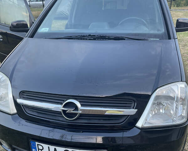 Черный Опель Мерива, объемом двигателя 0 л и пробегом 240 тыс. км за 1788 $, фото 1 на Automoto.ua