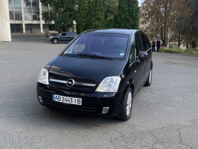 Черный Опель Мерива, объемом двигателя 1.6 л и пробегом 224 тыс. км за 4100 $, фото 1 на Automoto.ua