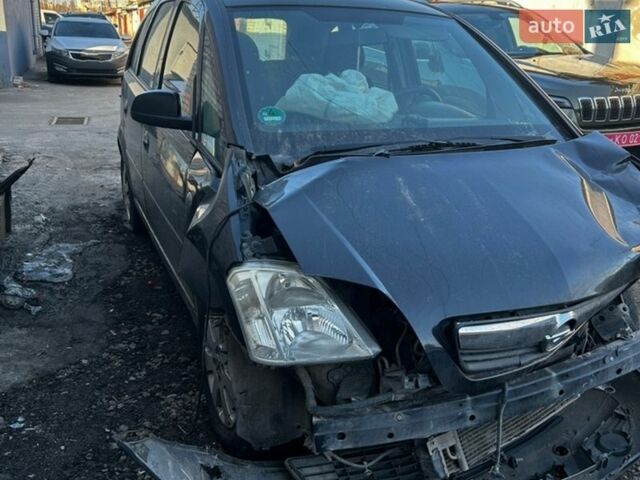 Черный Опель Мерива, объемом двигателя 1.6 л и пробегом 200 тыс. км за 1200 $, фото 1 на Automoto.ua