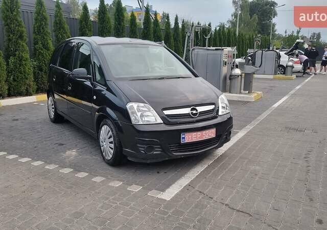 Черный Опель Мерива, объемом двигателя 1.6 л и пробегом 212 тыс. км за 4900 $, фото 1 на Automoto.ua