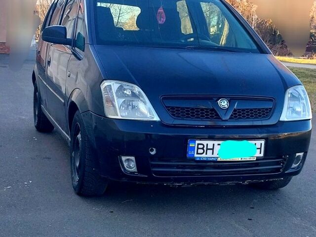 Черный Опель Мерива, объемом двигателя 1.3 л и пробегом 40000 тыс. км за 4900 $, фото 1 на Automoto.ua