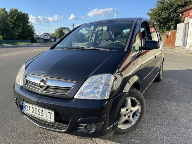 Черный Опель Мерива, объемом двигателя 1.6 л и пробегом 312 тыс. км за 3800 $, фото 1 на Automoto.ua