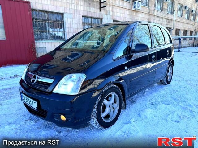 Черный Опель Мерива, объемом двигателя 1.6 л и пробегом 215 тыс. км за 3500 $, фото 1 на Automoto.ua