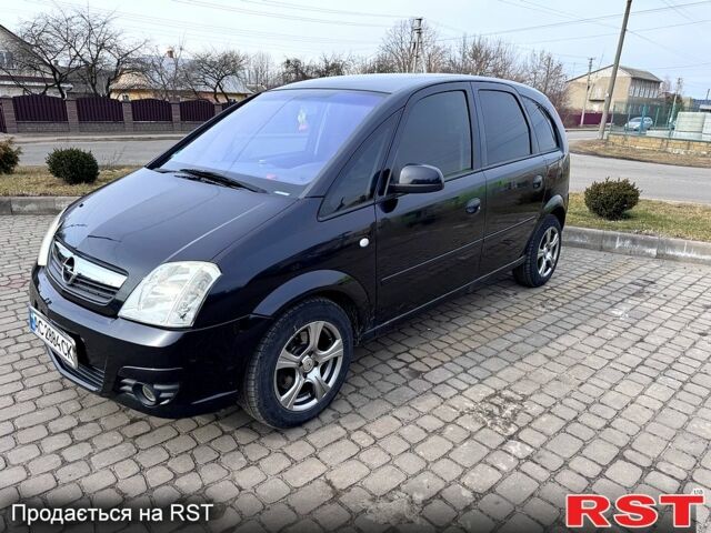 Черный Опель Мерива, объемом двигателя 1.6 л и пробегом 255 тыс. км за 3100 $, фото 1 на Automoto.ua