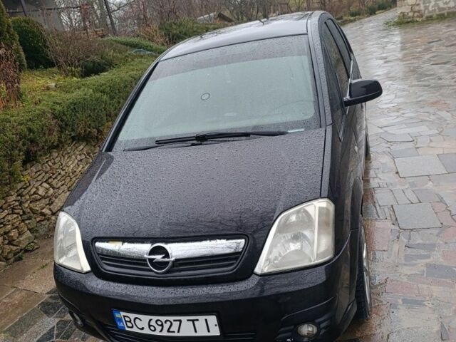 Черный Опель Мерива, объемом двигателя 1.6 л и пробегом 204 тыс. км за 3800 $, фото 1 на Automoto.ua