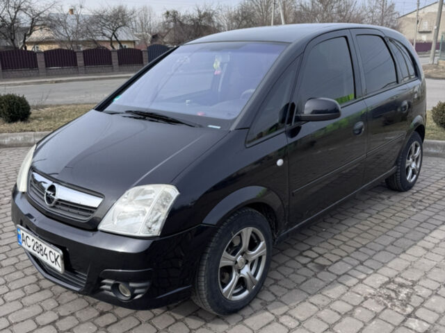 Черный Опель Мерива, объемом двигателя 1.6 л и пробегом 243 тыс. км за 3100 $, фото 1 на Automoto.ua