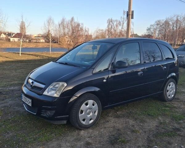 Черный Опель Мерива, объемом двигателя 1.36 л и пробегом 286 тыс. км за 4700 $, фото 1 на Automoto.ua