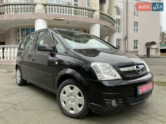 Черный Опель Мерива, объемом двигателя 1.6 л и пробегом 251 тыс. км за 4900 $, фото 1 на Automoto.ua