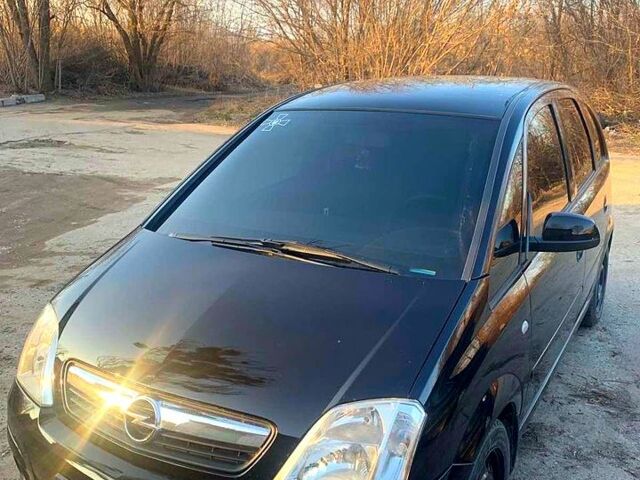 Черный Опель Мерива, объемом двигателя 1.6 л и пробегом 19600 тыс. км за 5100 $, фото 1 на Automoto.ua