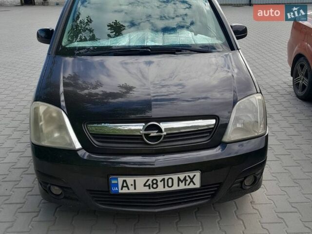 Черный Опель Мерива, объемом двигателя 1.6 л и пробегом 198 тыс. км за 4700 $, фото 1 на Automoto.ua