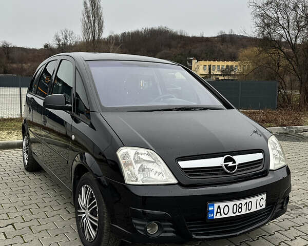 Черный Опель Мерива, объемом двигателя 1.6 л и пробегом 227 тыс. км за 4000 $, фото 1 на Automoto.ua