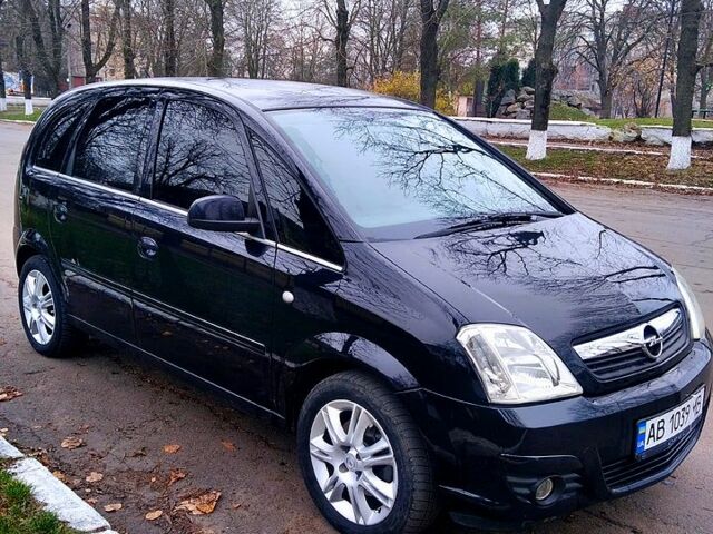 Черный Опель Мерива, объемом двигателя 1.6 л и пробегом 228 тыс. км за 4600 $, фото 1 на Automoto.ua