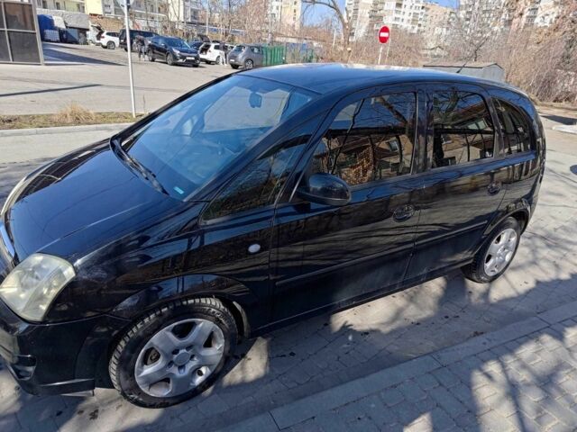 Черный Опель Мерива, объемом двигателя 1.7 л и пробегом 222 тыс. км за 4450 $, фото 1 на Automoto.ua