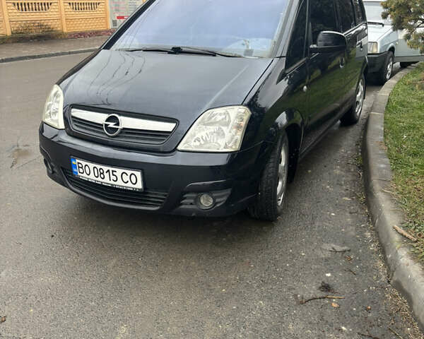 Черный Опель Мерива, объемом двигателя 1.6 л и пробегом 158 тыс. км за 4500 $, фото 1 на Automoto.ua