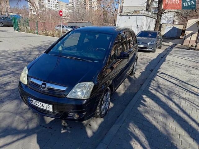 Черный Опель Мерива, объемом двигателя 1.7 л и пробегом 222 тыс. км за 4450 $, фото 1 на Automoto.ua