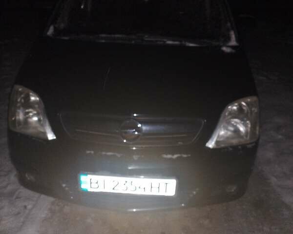 Чорний Опель Меріва, об'ємом двигуна 1.25 л та пробігом 224 тис. км за 5000 $, фото 1 на Automoto.ua