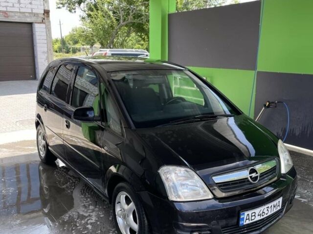 Черный Опель Мерива, объемом двигателя 1.6 л и пробегом 290 тыс. км за 4750 $, фото 1 на Automoto.ua