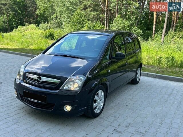 Черный Опель Мерива, объемом двигателя 1.8 л и пробегом 155 тыс. км за 4800 $, фото 1 на Automoto.ua