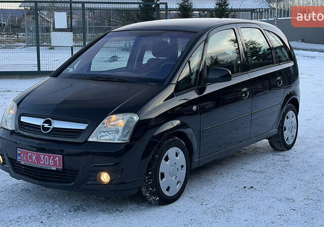 Черный Опель Мерива, объемом двигателя 1.6 л и пробегом 150 тыс. км за 5750 $, фото 1 на Automoto.ua