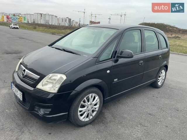 Черный Опель Мерива, объемом двигателя 1.6 л и пробегом 215 тыс. км за 4950 $, фото 1 на Automoto.ua