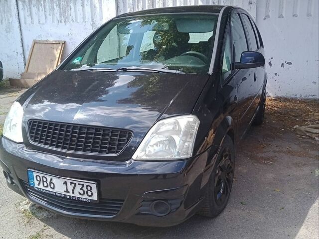Черный Опель Мерива, объемом двигателя 1.7 л и пробегом 250 тыс. км за 2300 $, фото 1 на Automoto.ua