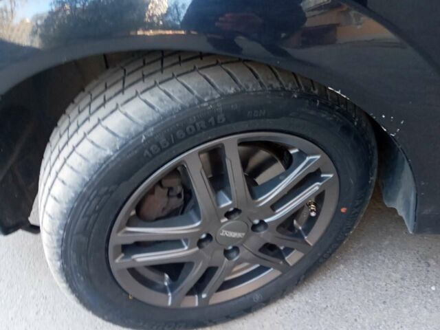 Черный Опель Мерива, объемом двигателя 1.2 л и пробегом 205 тыс. км за 6500 $, фото 1 на Automoto.ua