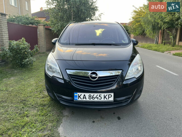 Черный Опель Мерива, объемом двигателя 1.69 л и пробегом 331 тыс. км за 7200 $, фото 1 на Automoto.ua