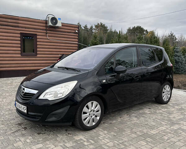 Черный Опель Мерива, объемом двигателя 1.69 л и пробегом 235 тыс. км за 7700 $, фото 1 на Automoto.ua