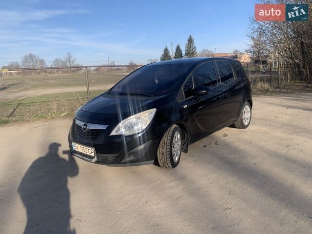 Черный Опель Мерива, объемом двигателя 1.25 л и пробегом 190 тыс. км за 6500 $, фото 1 на Automoto.ua