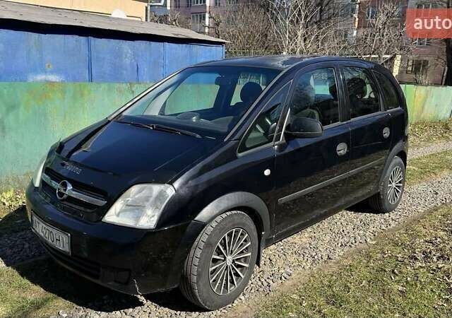 Черный Опель Мерива, объемом двигателя 1.69 л и пробегом 280 тыс. км за 3800 $, фото 1 на Automoto.ua