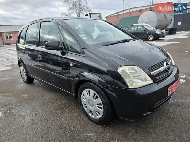 Черный Опель Мерива, объемом двигателя 1.6 л и пробегом 230 тыс. км за 3999 $, фото 1 на Automoto.ua
