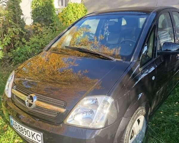 Черный Опель Мерива, объемом двигателя 1.6 л и пробегом 208 тыс. км за 3900 $, фото 1 на Automoto.ua