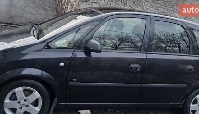Черный Опель Мерива, объемом двигателя 1.4 л и пробегом 150 тыс. км за 5000 $, фото 1 на Automoto.ua