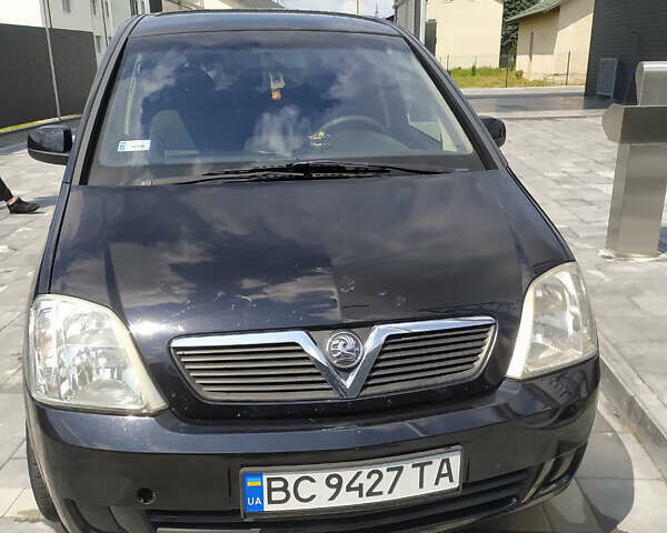 Черный Опель Мерива, объемом двигателя 1.6 л и пробегом 370 тыс. км за 3000 $, фото 1 на Automoto.ua