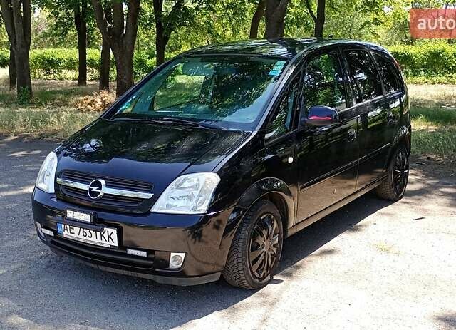 Черный Опель Мерива, объемом двигателя 1.6 л и пробегом 207 тыс. км за 4470 $, фото 1 на Automoto.ua