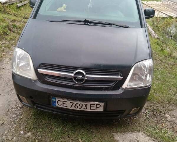 Черный Опель Мерива, объемом двигателя 1.69 л и пробегом 240 тыс. км за 2800 $, фото 1 на Automoto.ua