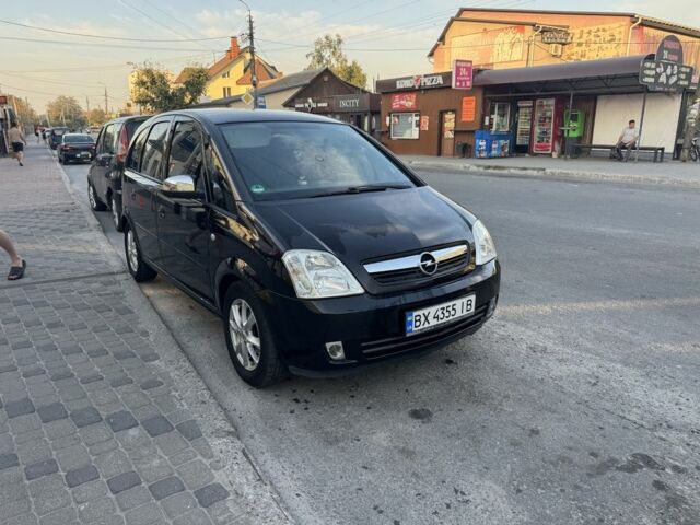 Черный Опель Мерива, объемом двигателя 1.4 л и пробегом 200 тыс. км за 3850 $, фото 1 на Automoto.ua