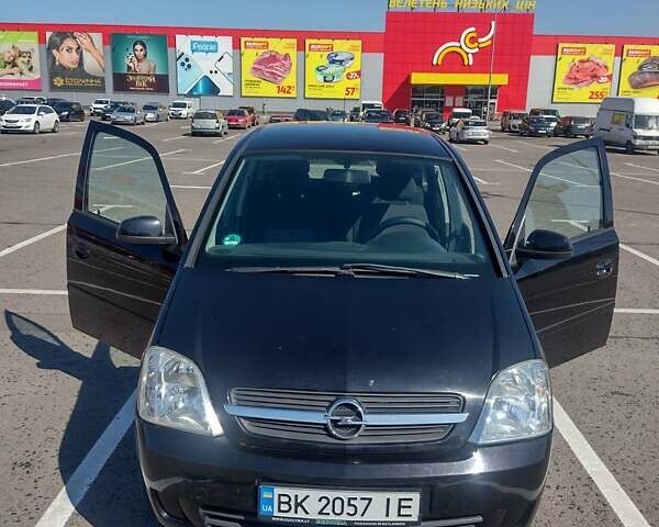 Черный Опель Мерива, объемом двигателя 1.36 л и пробегом 146 тыс. км за 4250 $, фото 1 на Automoto.ua