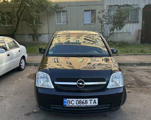 Черный Опель Мерива, объемом двигателя 1.6 л и пробегом 228 тыс. км за 4500 $, фото 1 на Automoto.ua