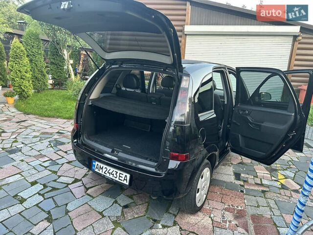 Черный Опель Мерива, объемом двигателя 1.6 л и пробегом 148 тыс. км за 4200 $, фото 1 на Automoto.ua
